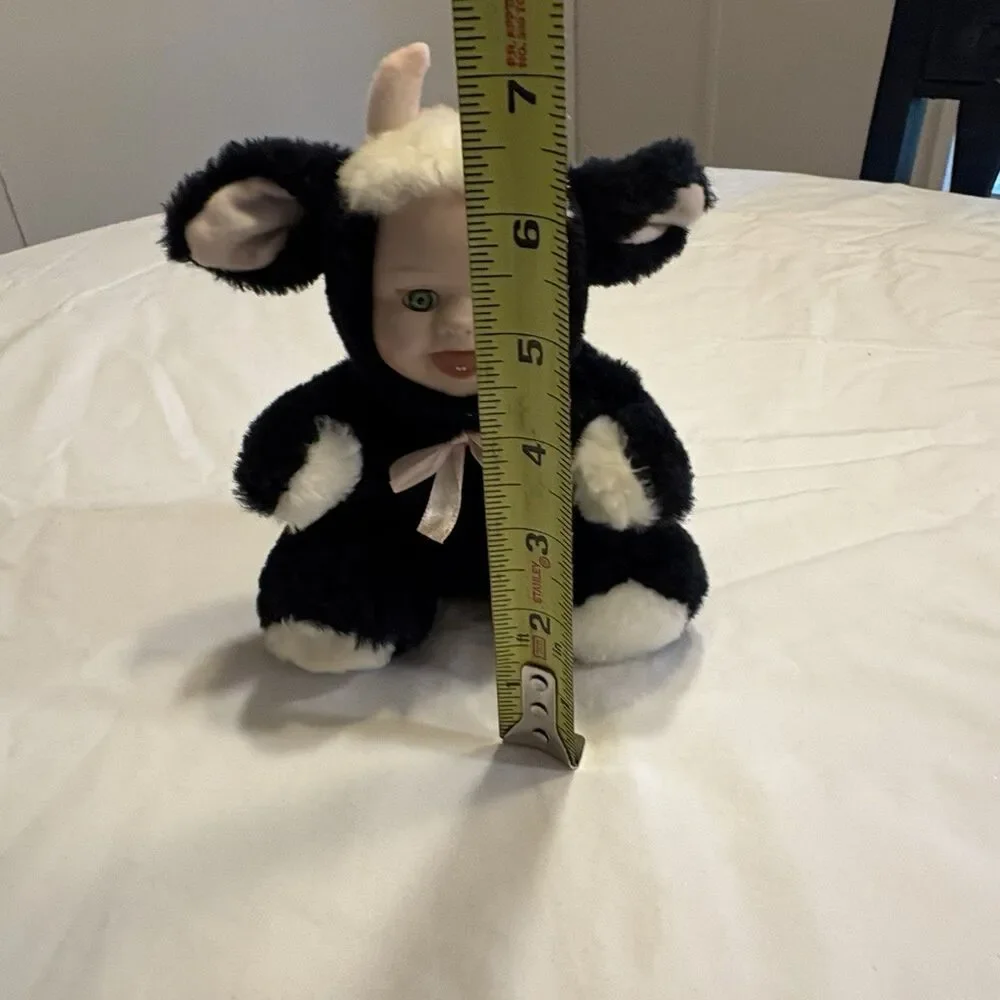 Vintage Rubber Face Baby With Cow Plush Suit